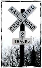 4. The yellow Diamond-Shaped Parallel Track sign identifies highway-rail intersections that appear immediately after making either a right or a left turn. Passive Signs AT Railroad Crossings 1.