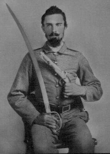 II. WEAPONS of the 1 st North Carolina Cavalry Early war photo of a 1 st NC trooper with M1833 dragoon saber and single shot pistol.