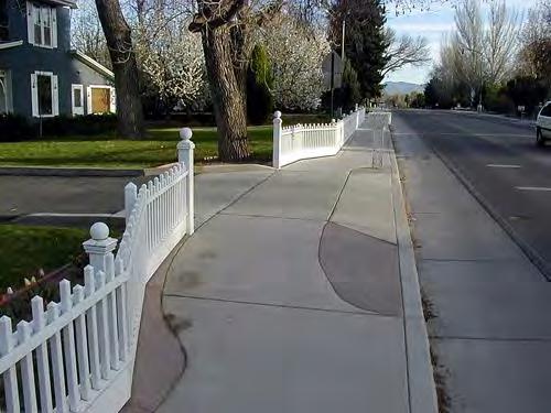 Some sidewalks slope at driveways and do not meet ADA guidelines if the grade of the slope is more than 2%.