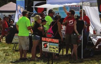 People attend for the: FREESTYLE SHOWS: Crowds gather to watch ATVs and dirt bikes perform exciting
