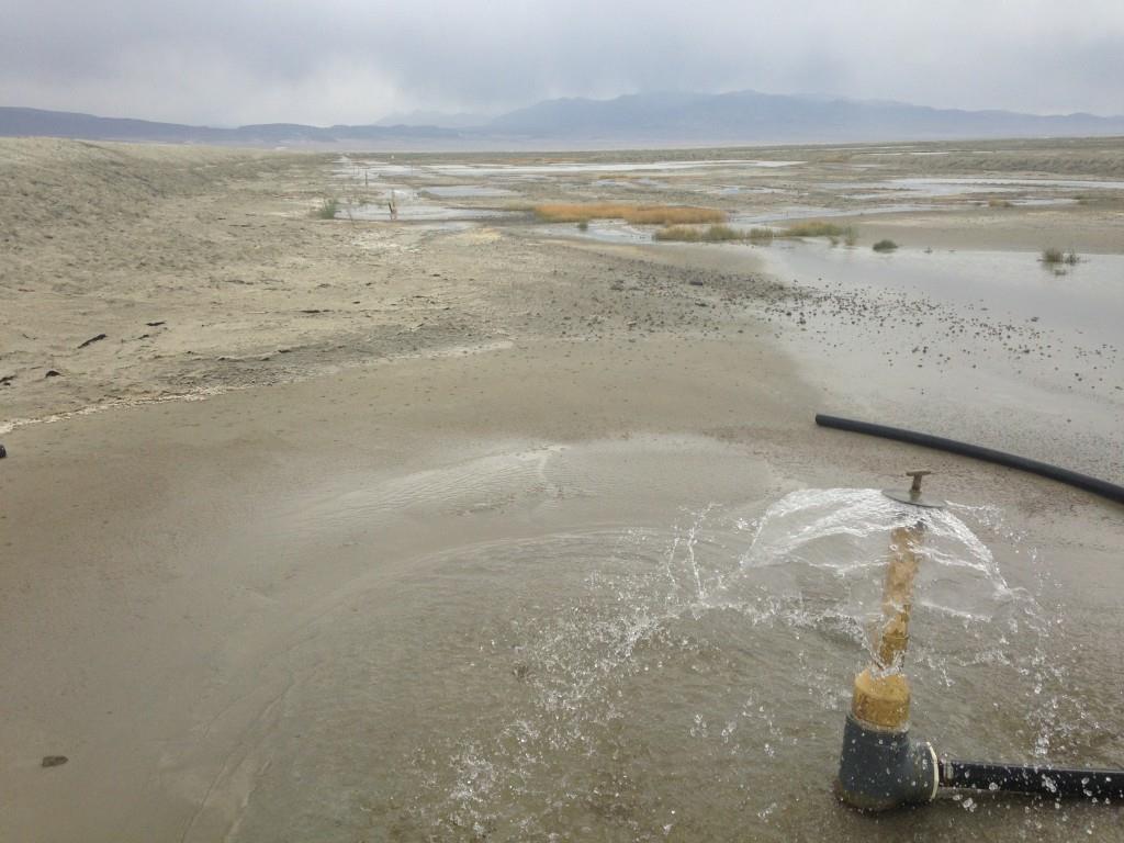 Mitigation at Owens Lake They spray a fine layer on water onto the lake sediments to keep them wet, so they are