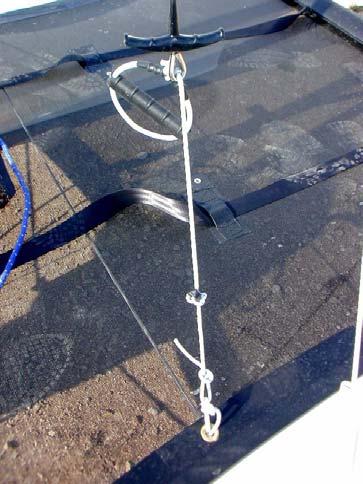 Use a bowline knot to secure the line to the trapeze shock cord.