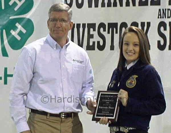 Awards ceremony honors winners Kinsey Ward of Chiefland Sr. FFA accepts a $500 scholarship check from Farm Credit Of Florida by Jeffrey Spencer. Story and Photos March 24, 2016 @ 10:57 p.m. Updated March 25, 2016 @ 8:47 a.