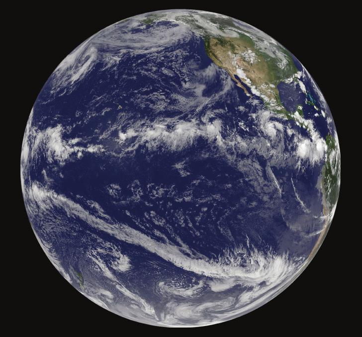 Figure 5 The long band of clouds extending to the southeast is called the South Pacific Convergence Zone.