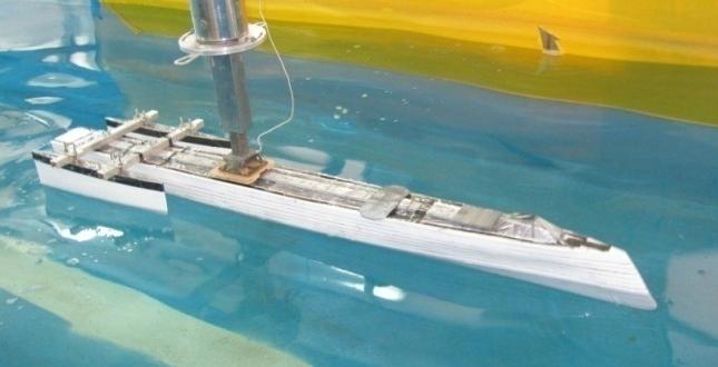 Other conditions such as trim and draft are so established that the real design conditions of the vessel are fulfilled.