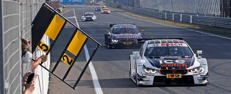 Augusto Farfus and Bruno Spengler finish second and third behind champion Mike Rockenfeller in the Drivers Championship.