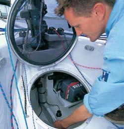 secure access hatch storage for outboard motor, bracket and other essentials. single point keel lift with removable keel post.