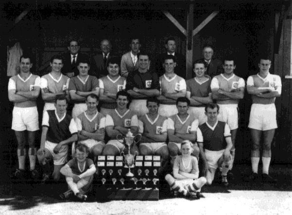 Lansil Football Club photographed outside the bowling green pavilion near the Lansil Sports & Social Club at the end of season 1962-63 after winning Division I of the North Lancs League on goal