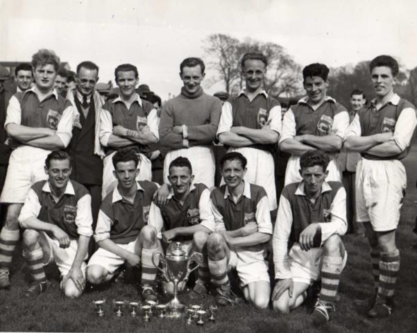 Third Division giant-killers, Lancaster Lads Club Old Boys, pictured in 1953-54 with the Senior Challenge Cup following their victory over the star-studded Division I champions Bentham