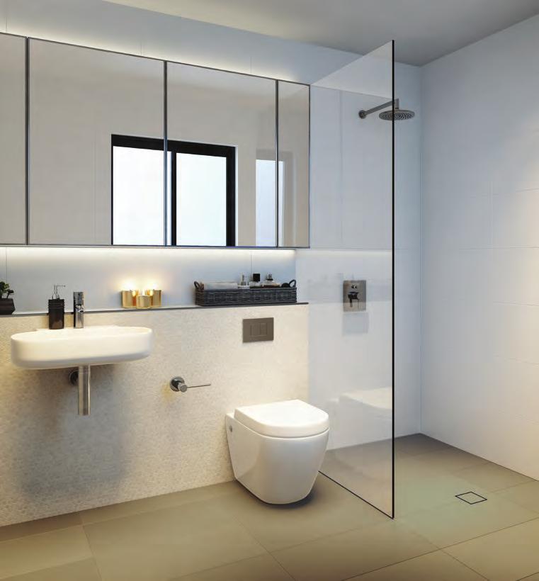 In accents of taupe and white, the bathrooms have a sleek, minimalist aesthetic with chrome hardware, mosaic feature wall tiles and frameless glass shower