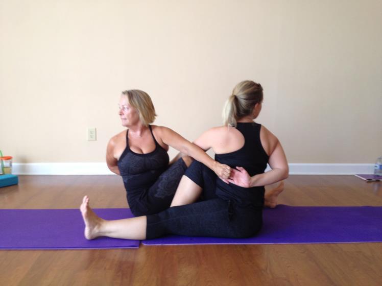 Seated Partner Twist One Leg Straight Benefits Stretches and tones the spine Improves digestion Relieves back tension Sit facing your partner with your legs extended side by side Bend the knee of