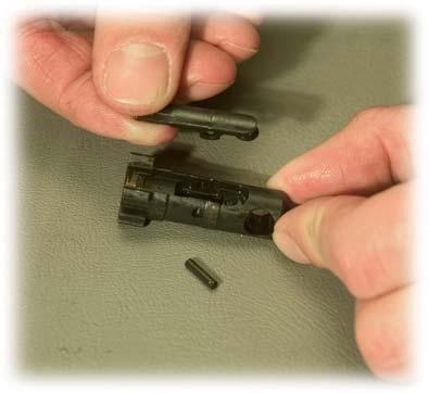 Clean and inspect the bolt, cam pin, firing pin and firing pin retaining pin thoroughly.