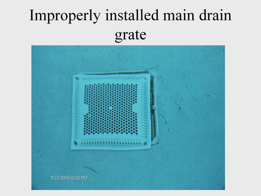 This is an image of an improperly installed main drain grate.