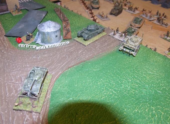 Volume 1, Issue 1 Page 3 Turns 5 & 6 0910 Stuck at the Wall The Canadians continue to try and use the tanks to shield the infantry in order to get more troops up to the sea wall.