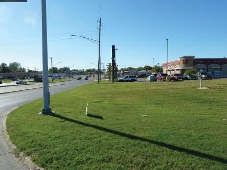 West 41st Street. Highway 97 and is a suburban commercial corridor for Sand Springs and is a wide divided highway with a grassed median.
