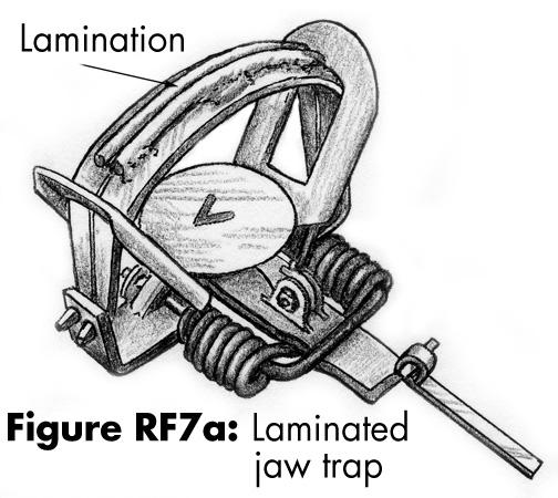 Chain attachment used in trap testing: 6 inch center-mounted with one swivel, one shock spring and anchored with a stake. Figure RF6a. Laminated jaw trap Figure RF6b.