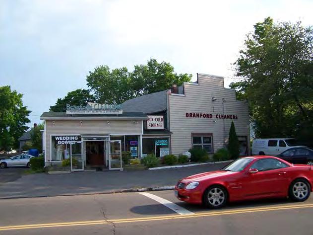 In this area, the visual character of the north side of Main Street is compromised by the backdoor views of commercial and service buildings that front on Route 1.