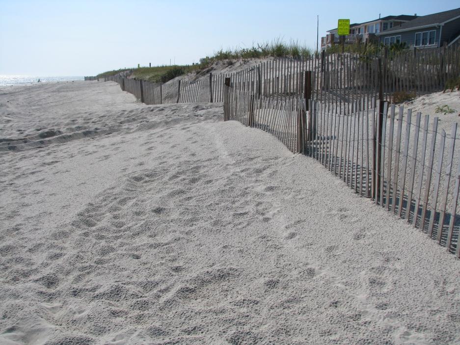 The 2008 Mother s Day northeast storm cut a scarp in the dunes that was not repaired.