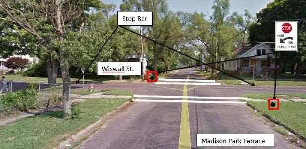 Figure E-19 shows the improvements suggested for the intersection of W. Wiswall St.
