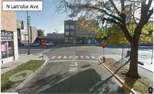 Figure E-76. Example of stop controlled marked crosswalk at the intersection of W. North Ave. and N. Latrobe Ave.