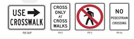 Figure 62. Pedestrian signs used in conjunction with fencing. 6.4.