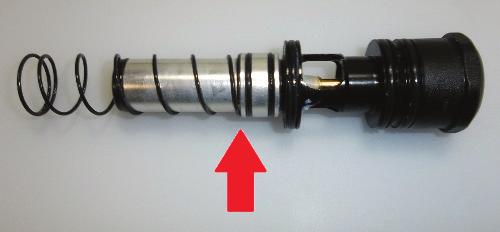 MAINTENANCE OF POPPET - Use a 3/32 hex wrench and insert it into the back of the Bolt Guide Cap. Turn counter-clockwise until Bolt Guide Cap is completely removed.