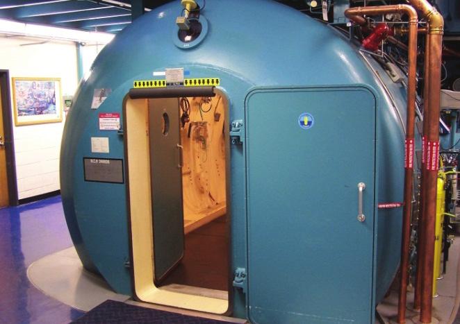 Multiplace hyperbaric chamber The left image shows the exterior and the right image shows the interior. IMAGES COURTESY OF THE AUTHORS.