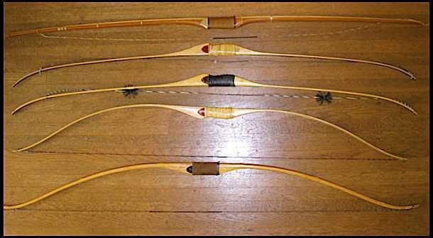 In Picture 4, above, are shown American longbows with the handle shaped.