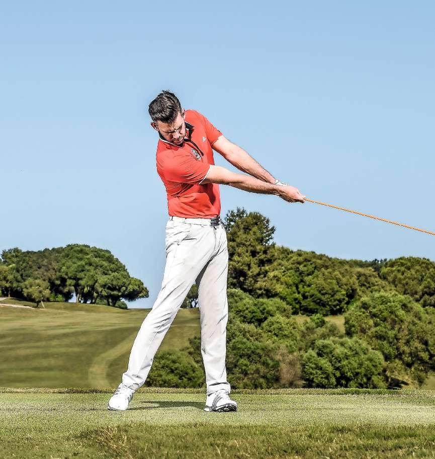DOWN AND OUT This drill also helps you get the feeling of extending upwards through impact.