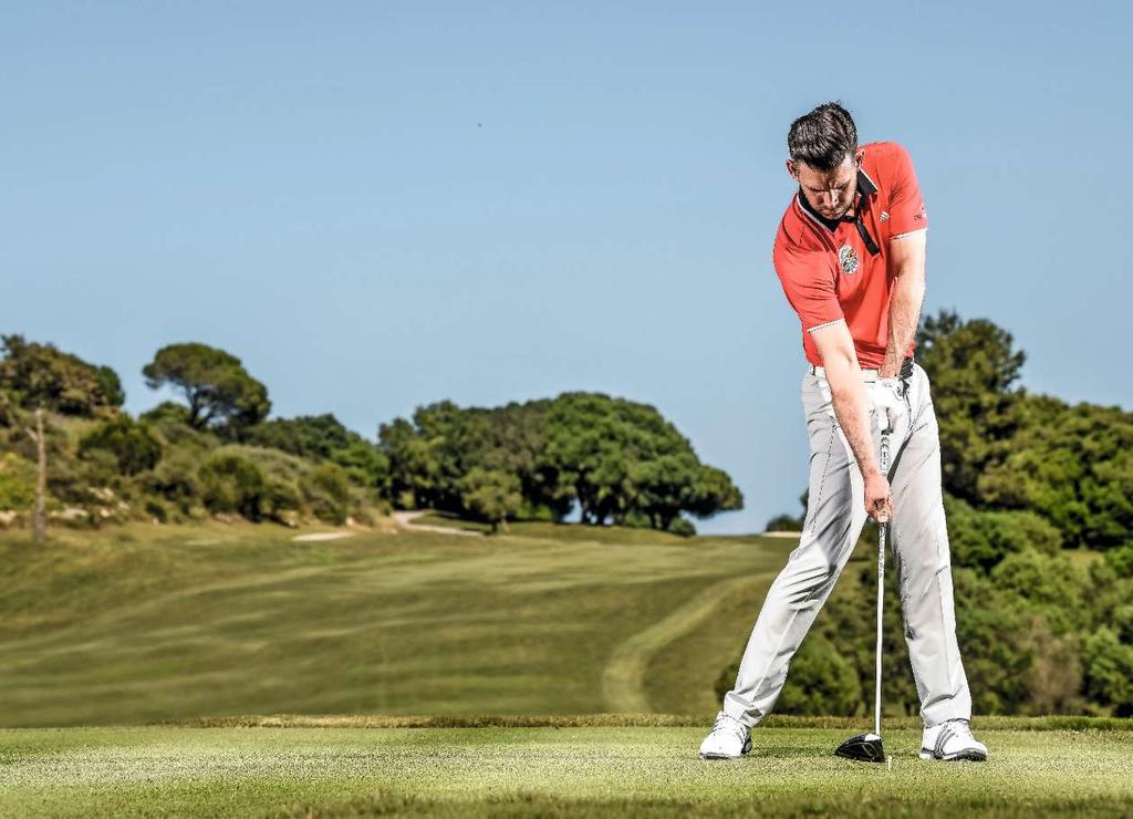 EXAGGERATE IT As you swing down to impact, experiment with pulling the lead hand up, away from the ball.