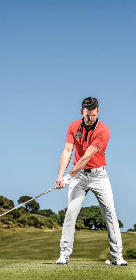 But lift the clubhead up and move it up the line towards the target, a couple of feet forward of the ball. PULL BACK Now pull the clubhead back over the ball and make a usual backswing.