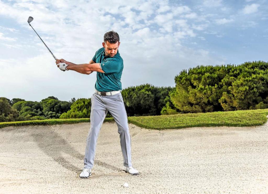 PASSIVE WRISTS Keep your wrists quiet throughout the backswing.