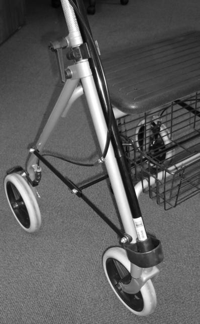 C A N E H O L D E R The steel rollator comes with a holder for a walking cane or crutch.