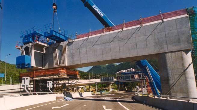 A 35 m span portal beam near the Heng On Interchange with the hanging girder fixed above the portal to