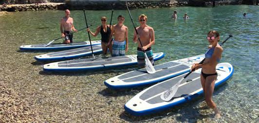 and practice on the water in protected bay with instructor: balance on SUP, paddling and board control, useful tips (40 min) - SUP tour with