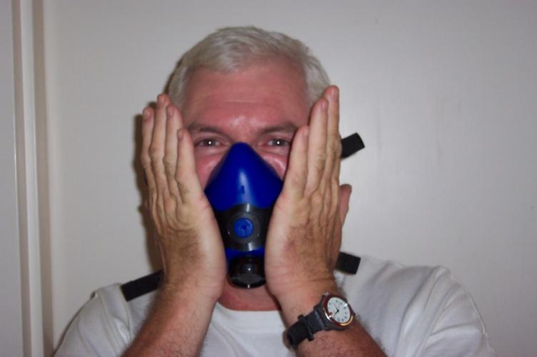 Negative Pressure Seal Check Begin by closing the respirator's inhalation valves with your hands, then breathe in slowly. The facepiece will collapse slightly.