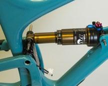 of the frame and tighten with a 10mm allen key until the bearings and seingarm make contact