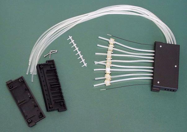 Remove the tip manifold, the tube fasteners and the rest of the tubing from the lower part of the dispensing cassette.