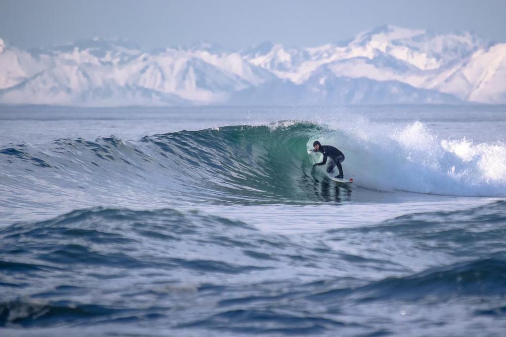 surfing in the ocean because the waves there are even in windless weather. Surfing in Russia is developing in large steps, and competitions are also taking place in Kamchatka on winter surfing.