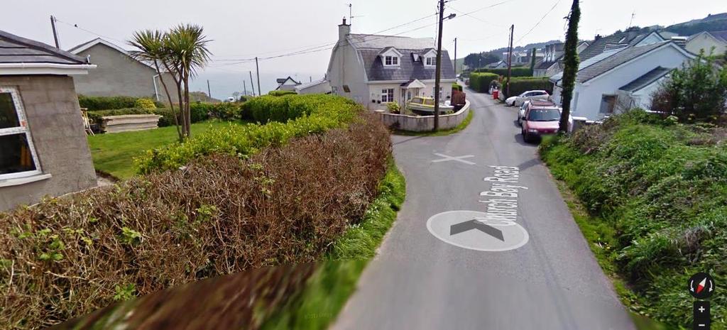 6 Below is the left turn mentioned at 6 above. You go down this hill to Church Bay. PLEASE BE CAREFUL PARKING AT CHURCH BAY. IT S A NARROW ROAD. DON T BLOCK THE ROAD. DON T BLOCK GATES AND HOMES.