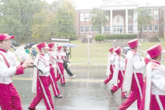 Marching past the original school were the Blair Marching Band (above, left); the Blair Pom Pom