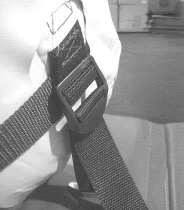 Step 8 Feed the short strap through the buckle on the side of the Slide. Loosely fasten. Repeat for other side of Slide. Center Slide nicely between the straps then tighten both straps.
