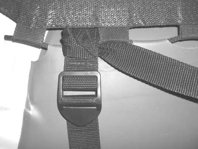 Step 5 Wrap the short strap under itself and through the jump mat lacing as shown.