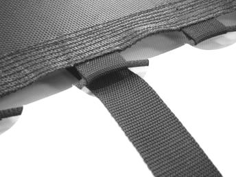 Note: the top two straps should run through the semi-circular cut-outs on the lacing apron as shown. When properly installed, there will be two cutouts between the straps.