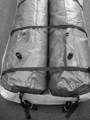 Loosely buckle all straps leaving slack to allow for full inflation of the tubes. Ensure cover is evenly positioned over the tubes and the end flaps are parallel to the ground.