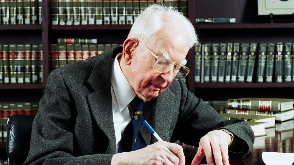 Rethinking the Theory of the Firm? Ronald Coase working in 2003.