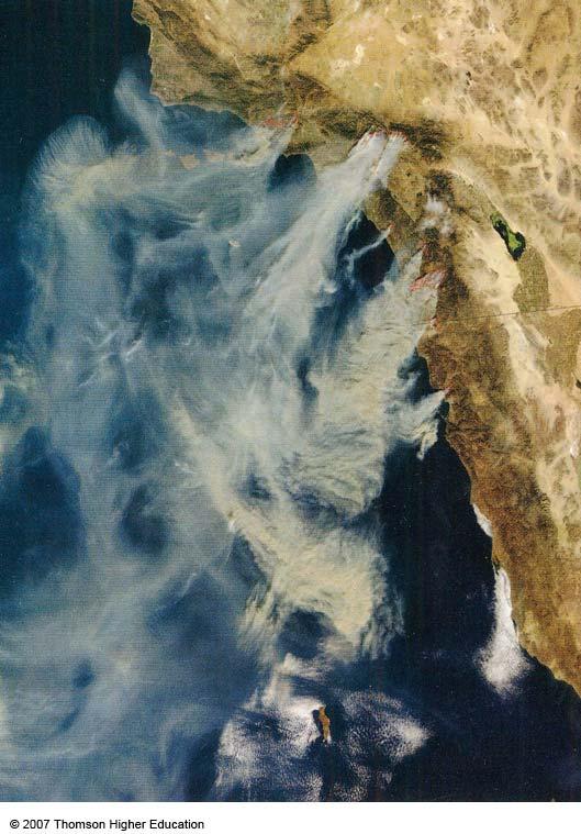 Strong northeasterly Santa Ana winds on October 28, 2003, blew the smoke from massive wild fires