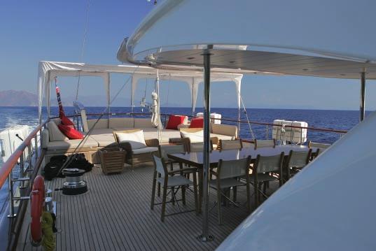 Socially, the focal point of the yacht is its open-air table at