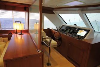 The deck saloon has windows all round, with roomy sofas and a