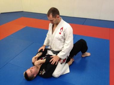 By keeping your elbows in front of their knees you limit his ability to attack you with submissions. 1.